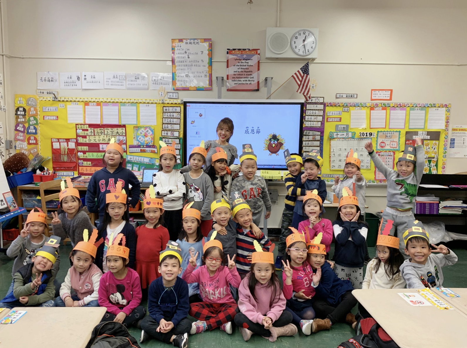 Dora with students in a bilingual classroom